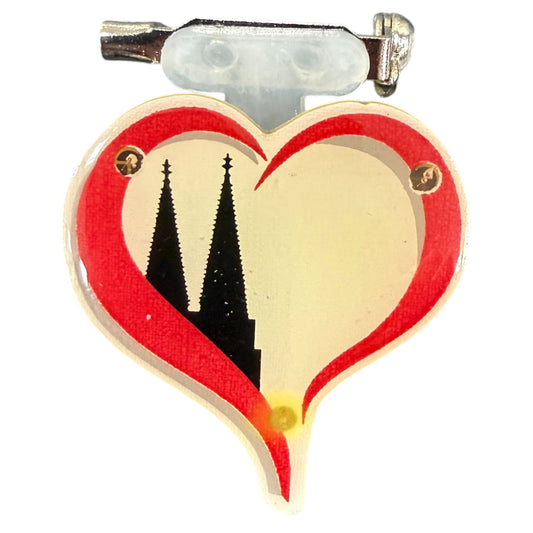 LED-Anstecker in Herzform mit Kölner Dom Silhouette und rotem Rand, blinkend als Karnevalsaccessoire