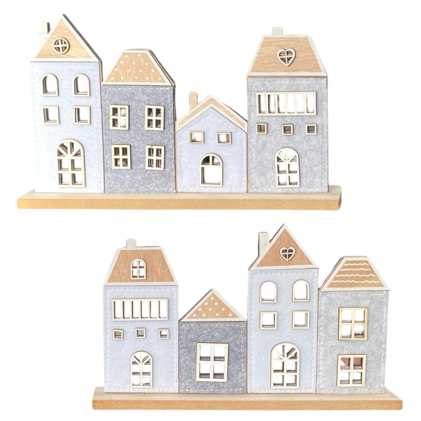 Häuserreihe aus Holz mit Filz in zwei verschiedenen Varianten vor weißem Hintergrund
