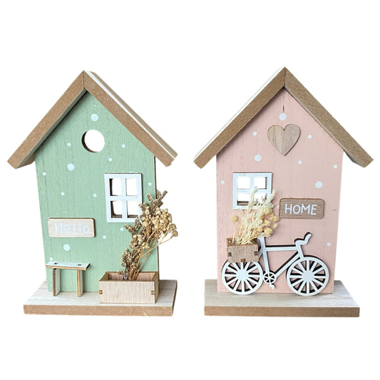 Aufsteller Haus aus Holz in Mint und Rosa mit Deko-Elementen wie Fahrrad und Trockenblumen