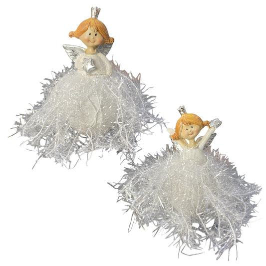 Zwei verschiedene Engelchen mit einem Glitzerkleid vor weißem Hintergrund