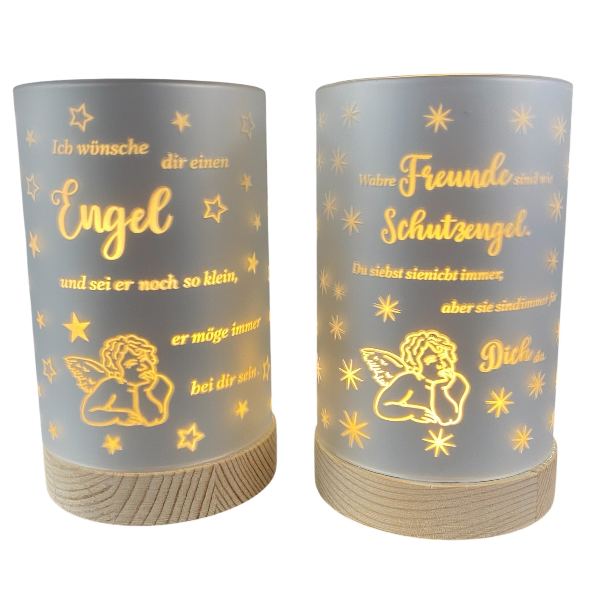 Zwei graue LED-Dekolicht-Säulen mit silbernem Schriftzug und Engelmotiv auf Holzfuß in verschiedenen Varianten.