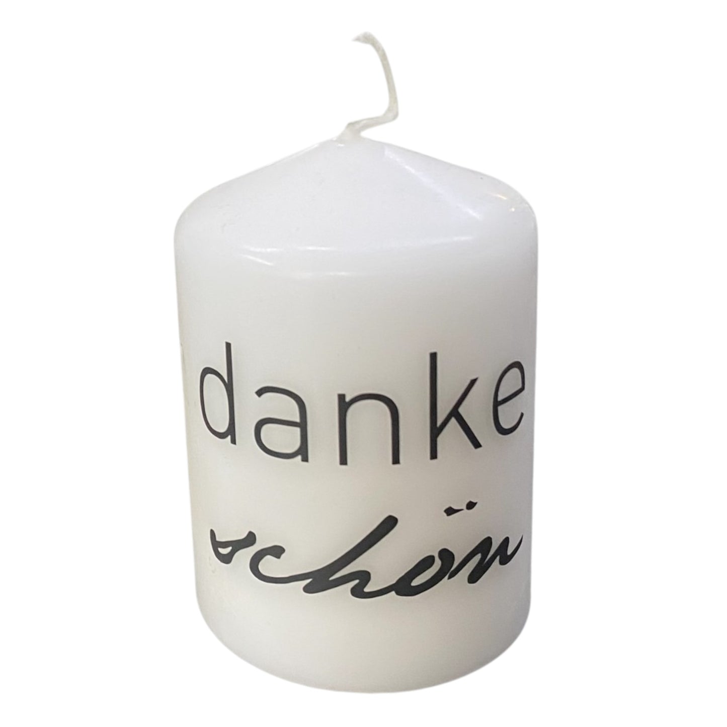 Weiße Stumpenkerze mit schwarzem Schriftzug „dankeschön“