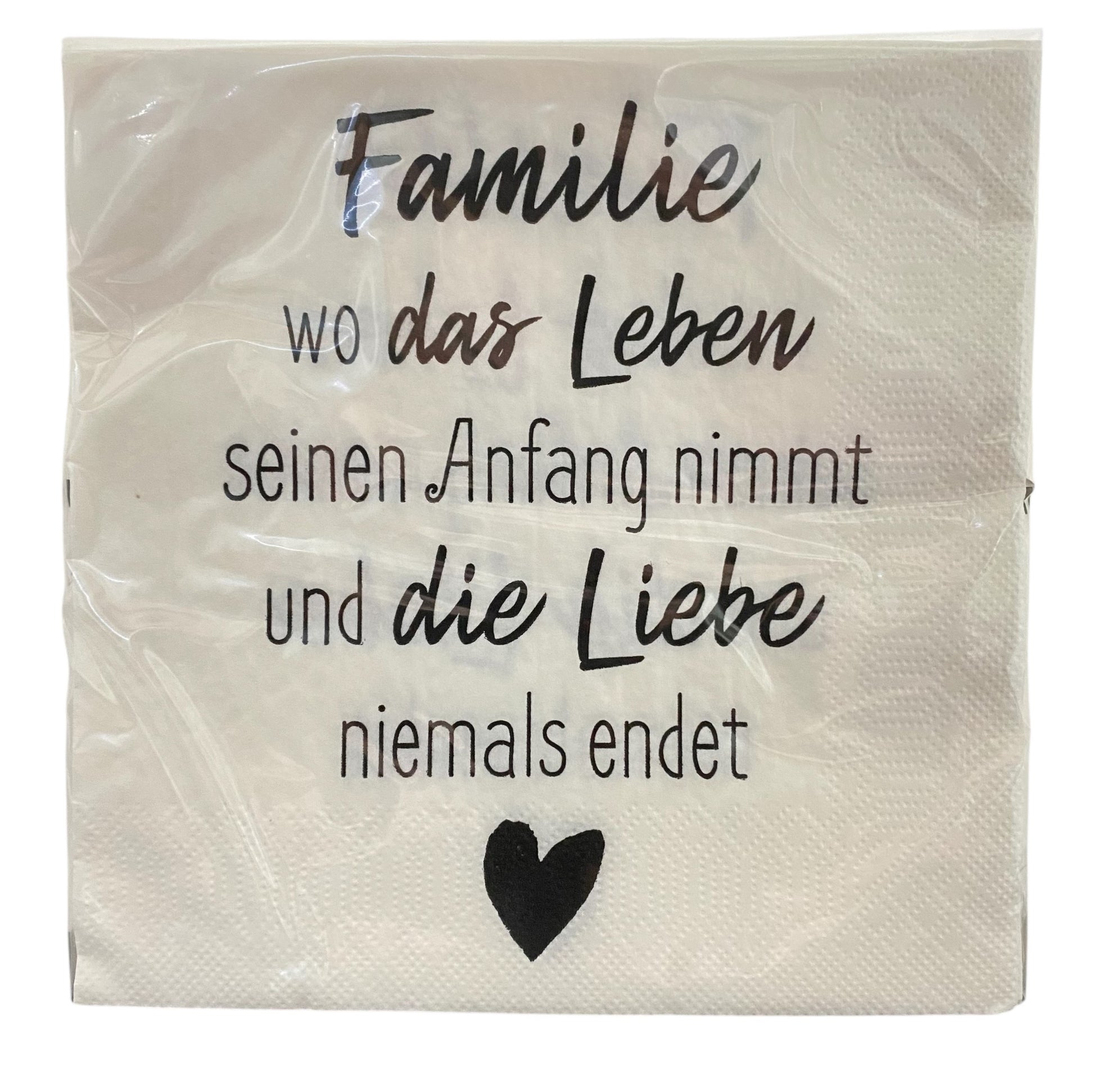 Weiße Servietten mit der Aufschrift "Familie wo das Leben seinen Anfang nimmt und die Liebe niemals endet".