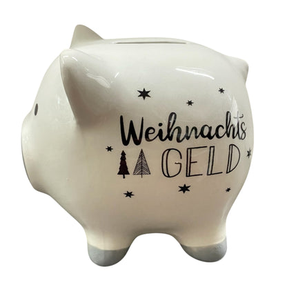 Sparschwein mit der Aufschrift "Weihnachtsgeld" vor weißem Hintergrund