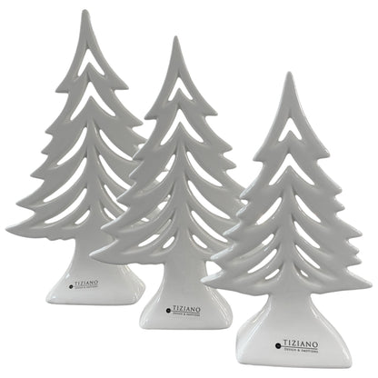 Drei Deko Tannenbäume aus creme weißer Keramik mit Aussparungen zum Aufstellen in drei Größen 