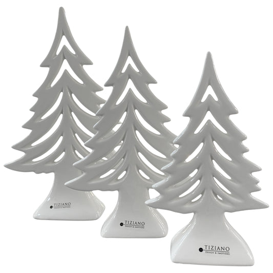 Drei Deko Tannenbäume aus creme weißer Keramik mit Aussparungen zum Aufstellen in drei Größen 