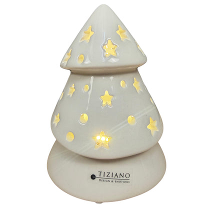 Beleuchteter Tiziano Dekobaum Venta aus cremeweißer Keramik mit warmem LED-Licht, Sternen und runden Öffnungen auf weißem Hintergrund.
