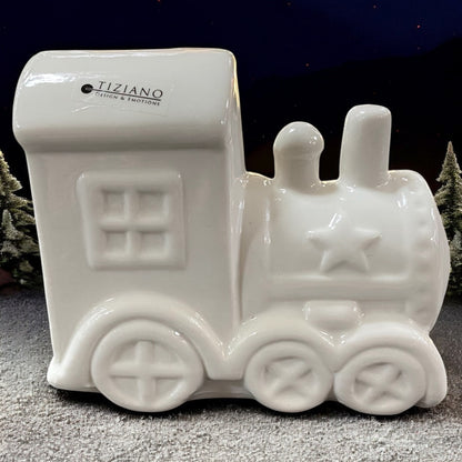 Tiziano Keramik-Lok in Creme mit Sternverzierung, winterliche Weihnachtsdekoration vor nächtlichem Hintergrund.