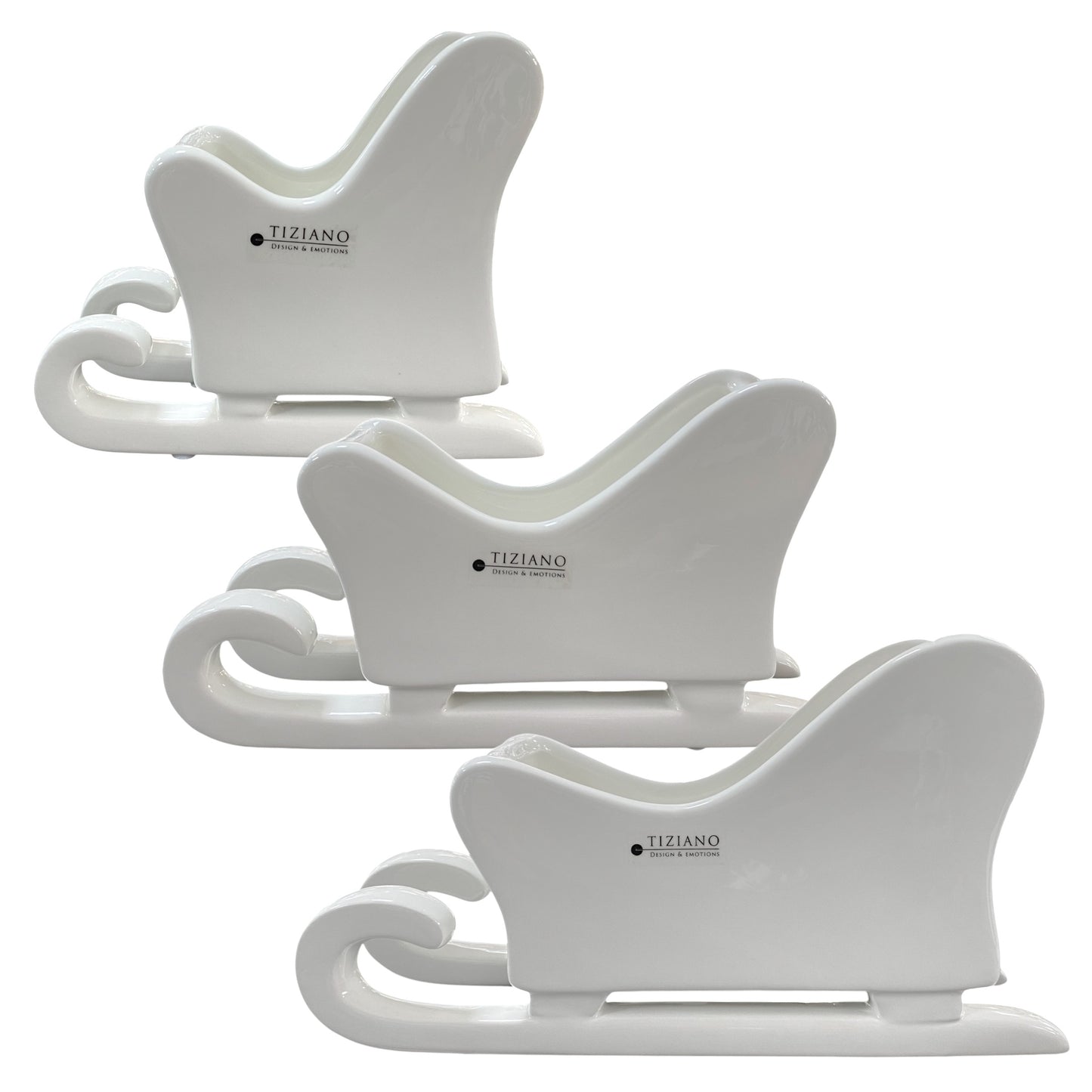 Drei Keramik Schlitten aus creme weißer Keramik mit Hohlraum zum Bepflanzen oder Teelichthalter von Tiziano in drei Größen