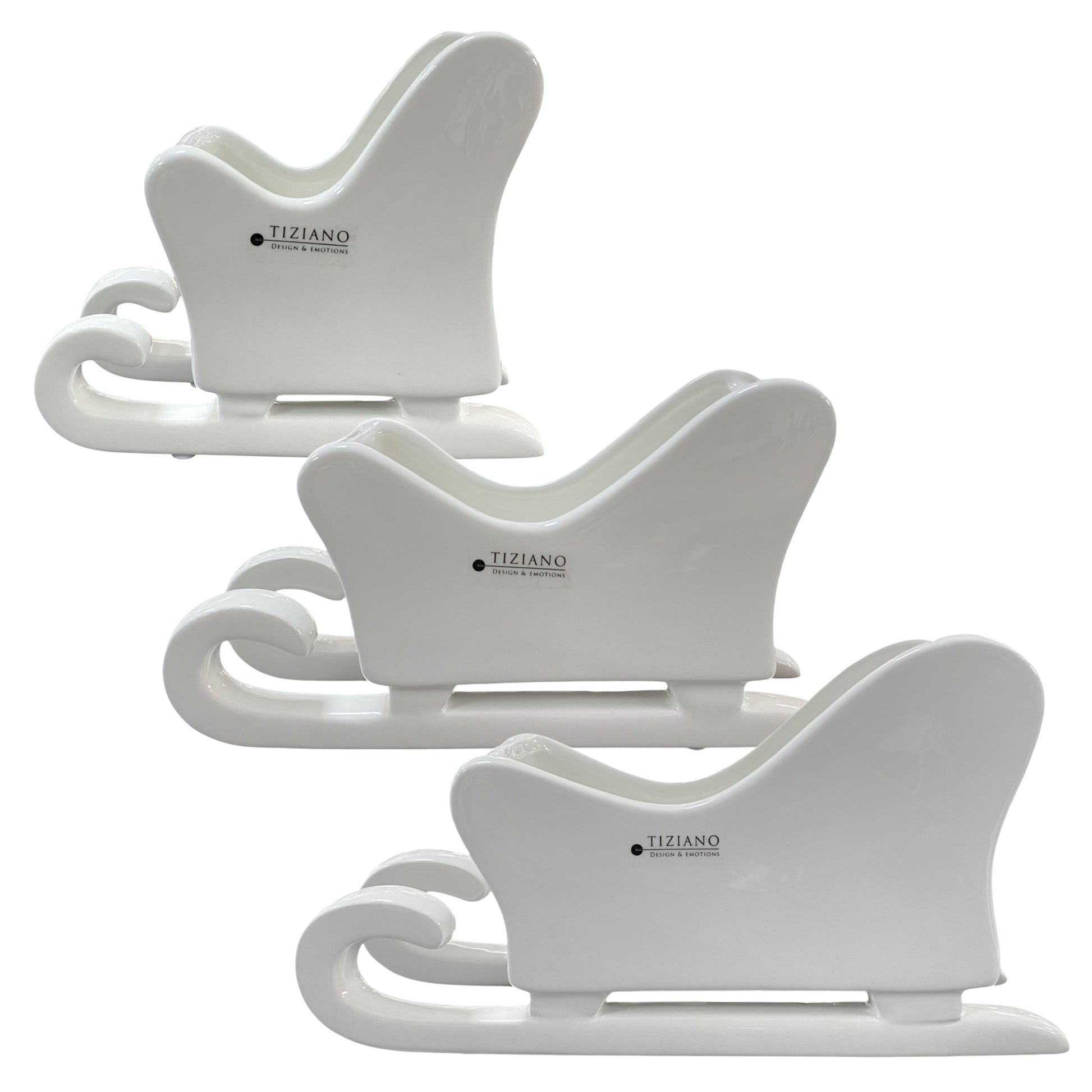 Drei Keramik Schlitten aus creme weißer Keramik mit Hohlraum zum Bepflanzen oder Teelichthalter von Tiziano in drei Größen