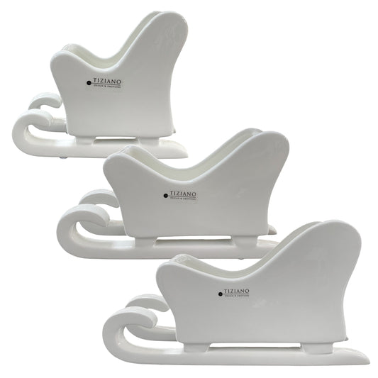 Drei Keramik Schlitten aus creme weißer Keramik mit Hohlraum zum Bepflanzen oder Teelichthalter von Tiziano in drei Größen